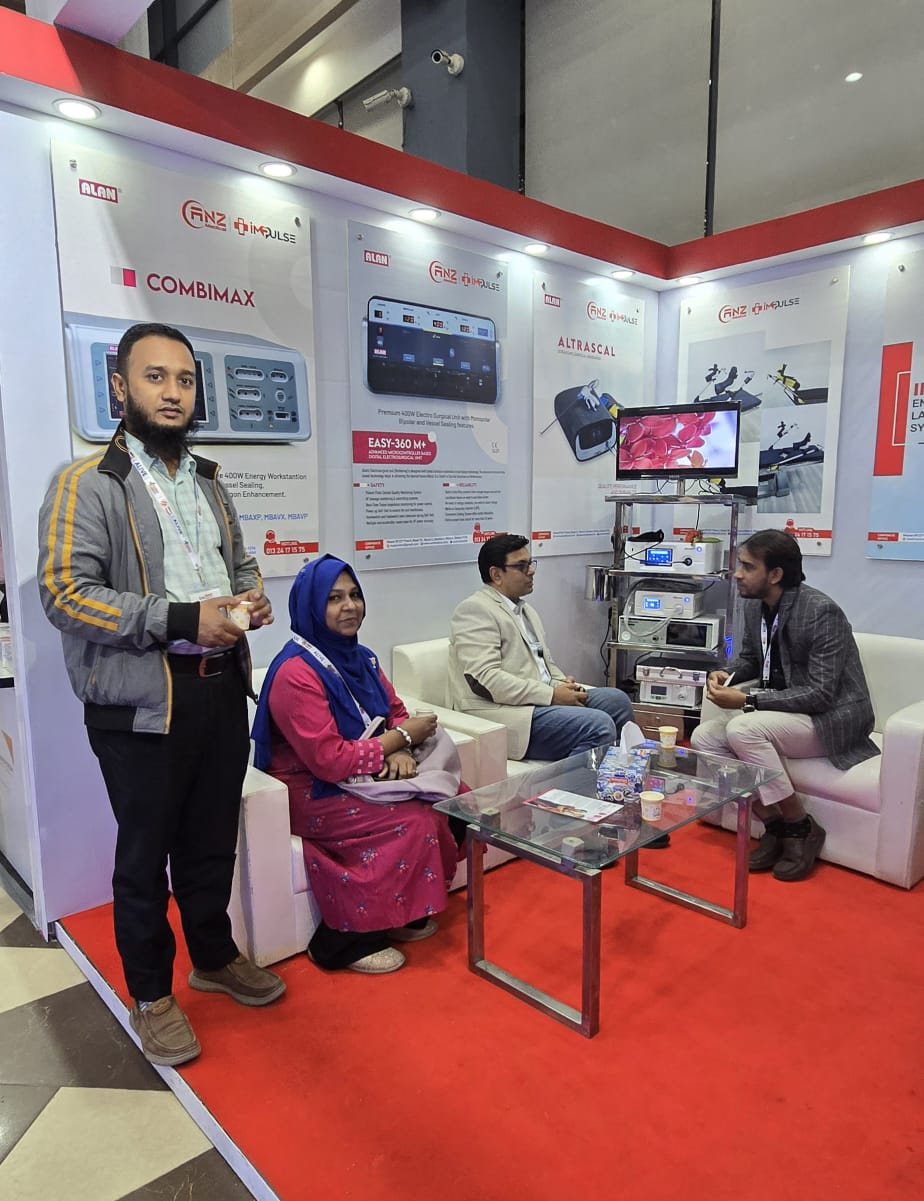 Sanforce team demonstrating an ALAN Combimax electrosurgical unit to a client